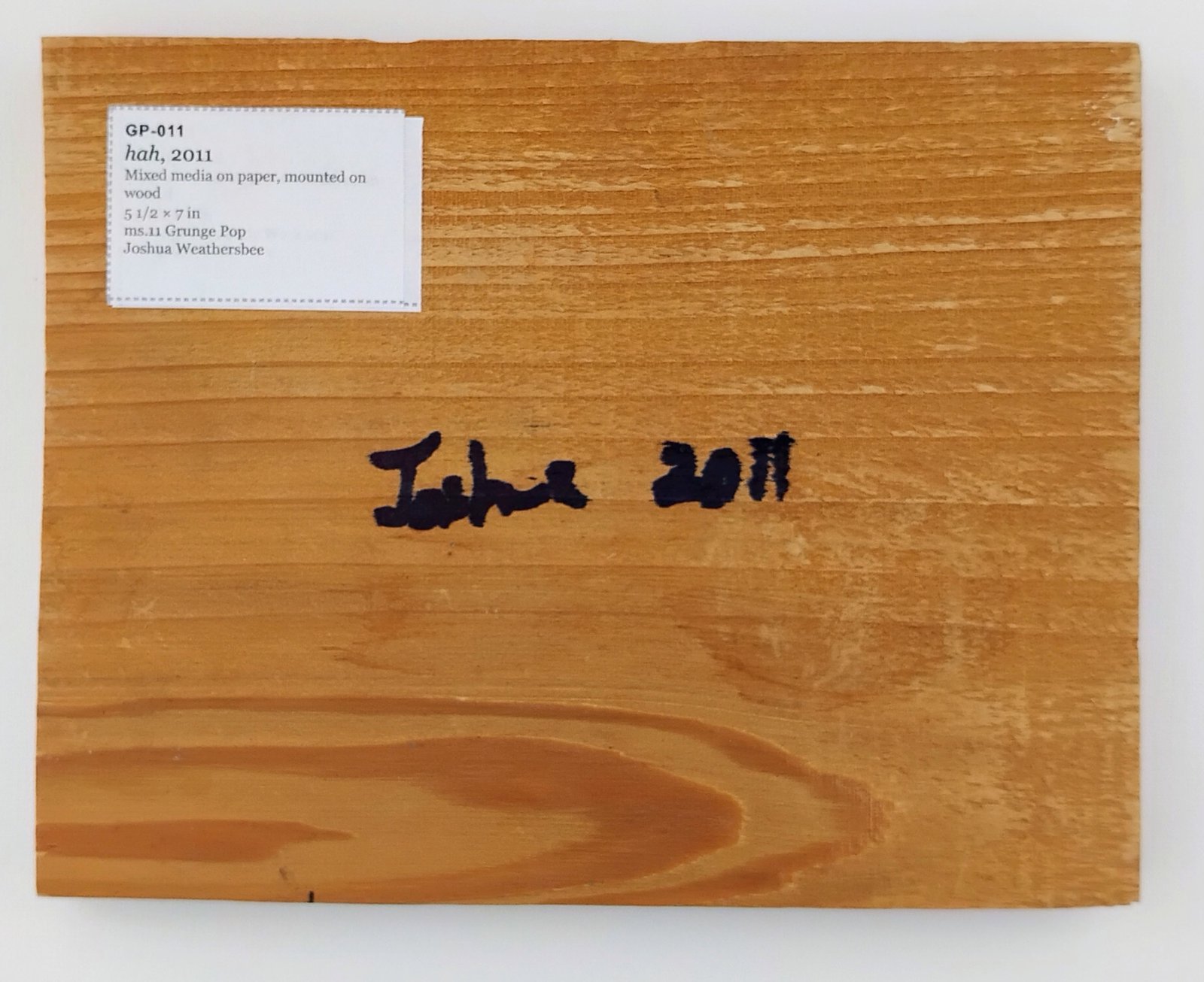 Back of hah, showing signature and label