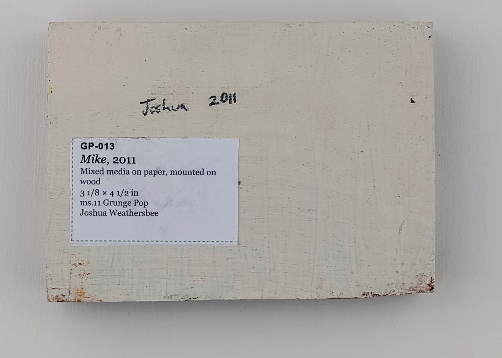 Back of Mike, showing signature and label