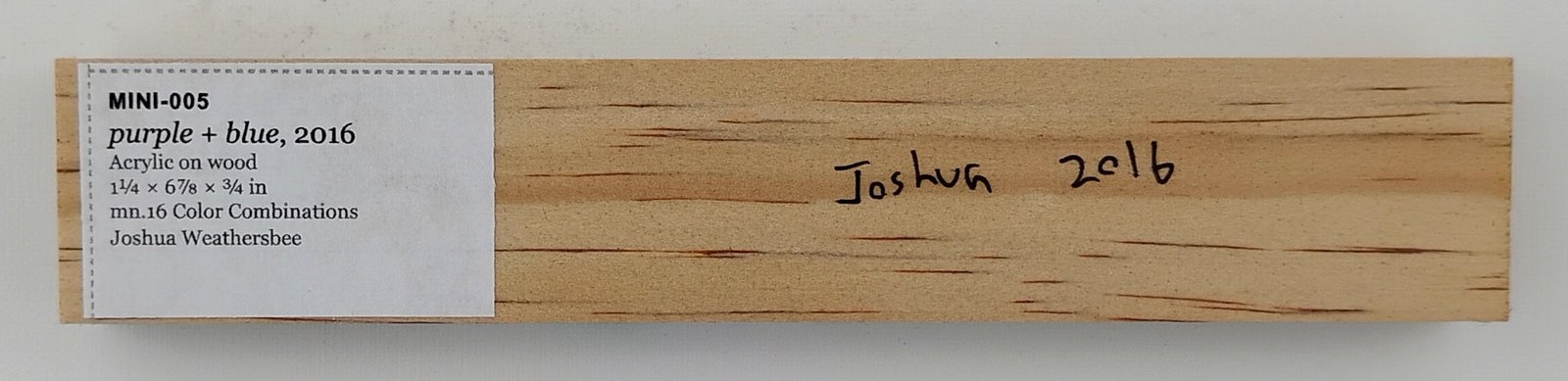 Back of purple + blue, showing signature and label