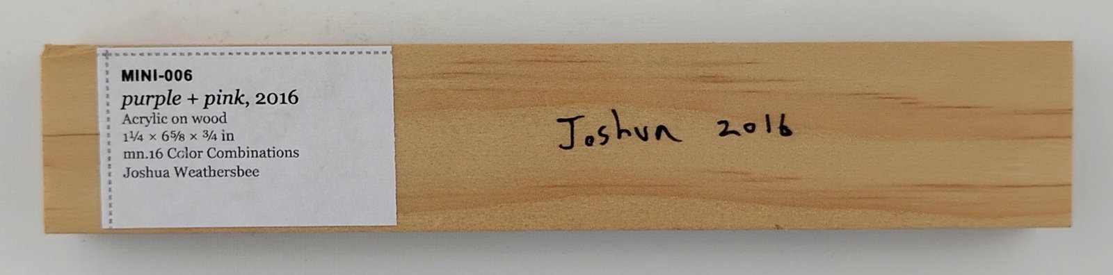 Back of purple + pink, showing signature and label